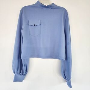 Elegant Women's Sky Blue Blouse with Buttoned Sleeves